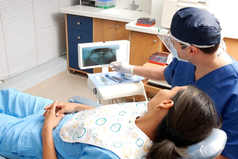 Dentist with display monitor